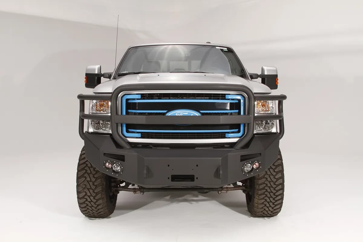 Premium Heavy Duty Winch Front Bumper; 2 Stage Black Powder Coated; w/Full Grill Guard; Incl. 1 in. D-Ring Mounts/Light Cut-Outs w/Hella 90mm Fog Lamps And 60mm Turn Signals;