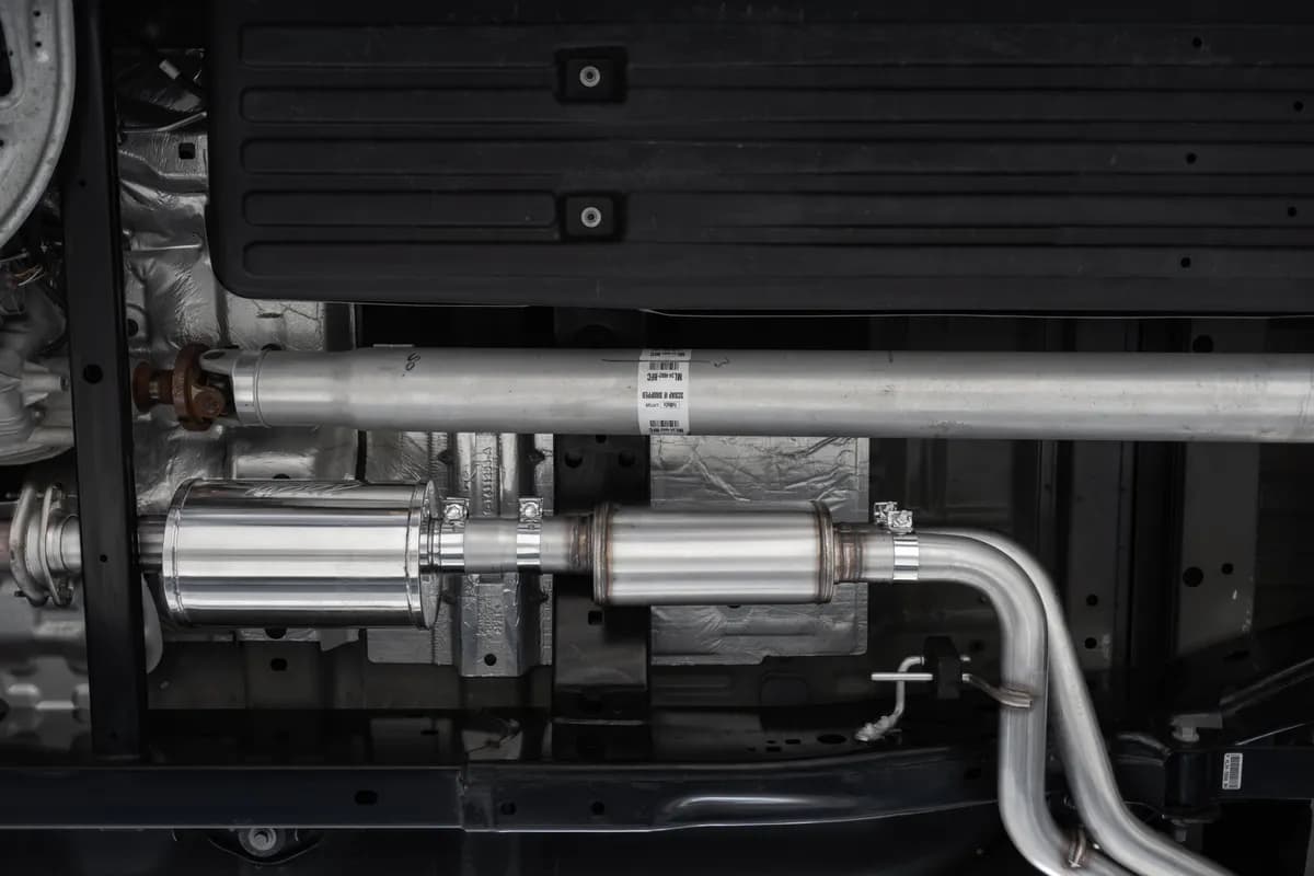 Armor BLK Cat Back Performance Exhaust System; 3 in.; Black Coated; 2.5 in. Dual Pre-Axle; W/4 in. OD. Tips; Street Profile;