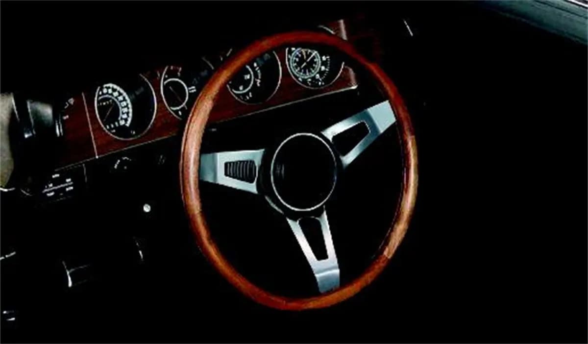 Classic Series Nostalgia Steering Wheel; 15 in. Diameter; 1 3/4 in. Dish; Walnut Hardwood Grip; Steel Nickel Plate 3-Spoke Design; Includes Horn Button PN[5699];
