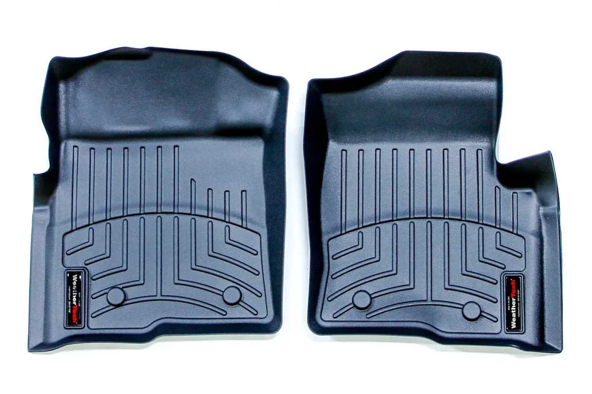 Black Front FloorLiner Ford F150 2009 - 2014 Fits models with 1st row under seat heading vents; does not fit models with floor-mounted 4x4 shifter; fits vehicles with dual floor posts