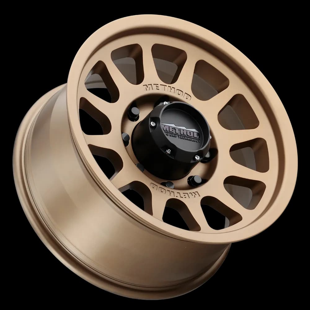 Aluminum Wheels 17x9 Bead Grip MR703 Bolt Pattern 8 On 165.1 Offset -12 Lip Size 1.18 Method Bronze BRZ Method