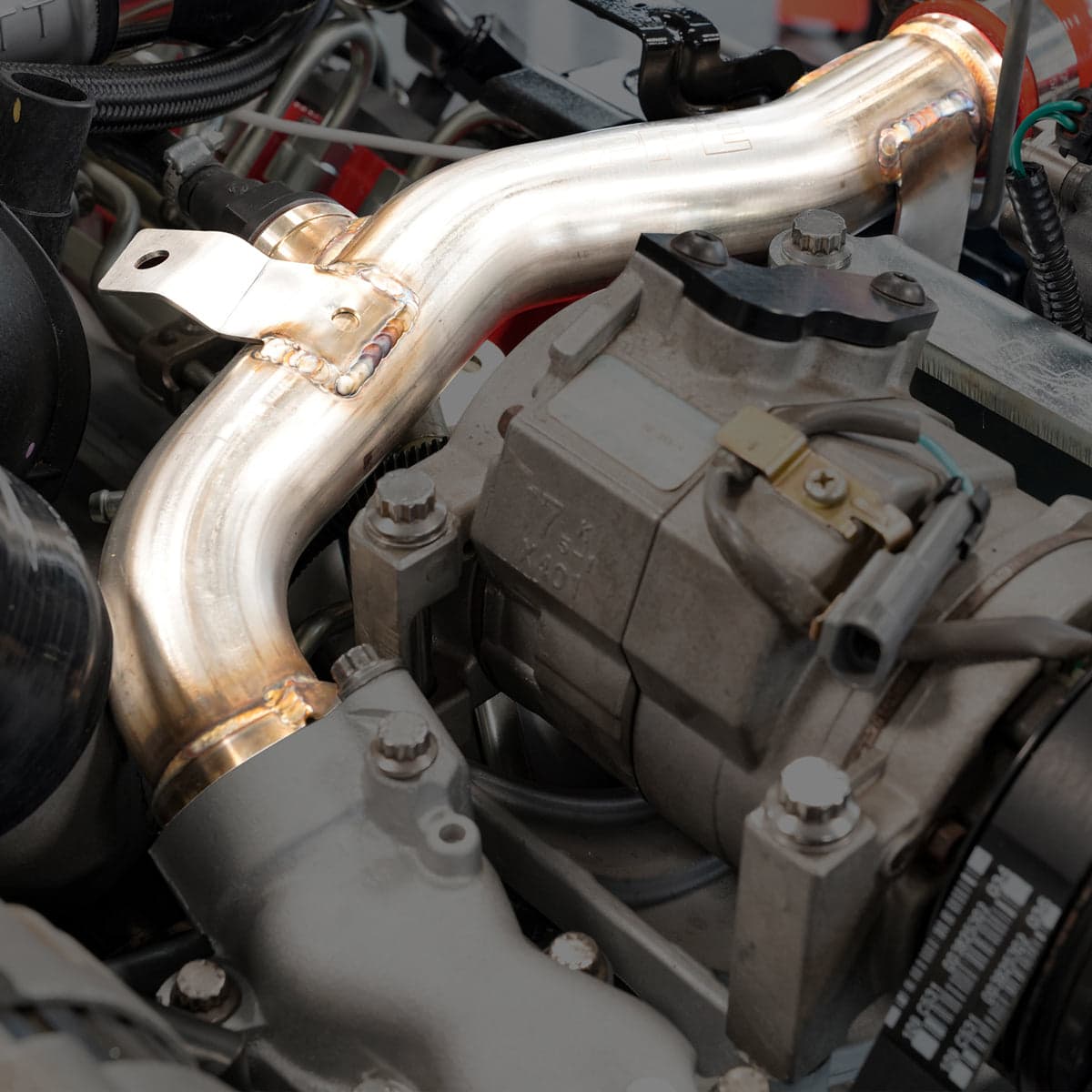 304 Stainless Steel Engine Coolant Return Pipe - 2006-2010 GM 6.6L Duramax LBZ LMM - Polished product image